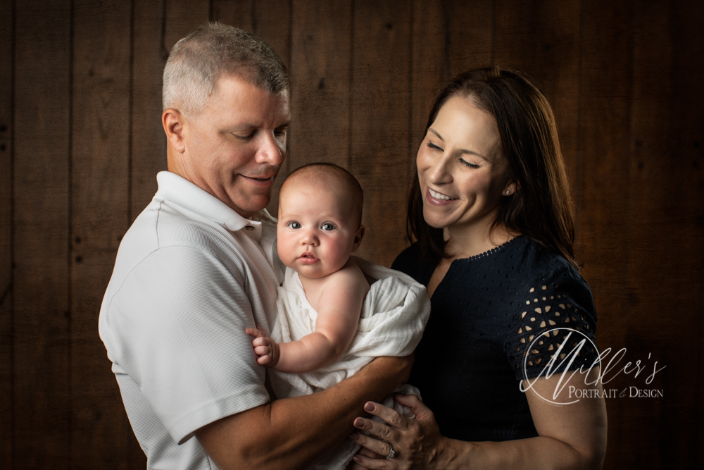 Sweet Mom and Dad Portrait with Baby